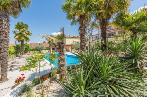 Lauschiges Apartment mit 60m2 Pool, Babybett, Waschmaschine, Grillbereich - nur 800 Meter zum Strand